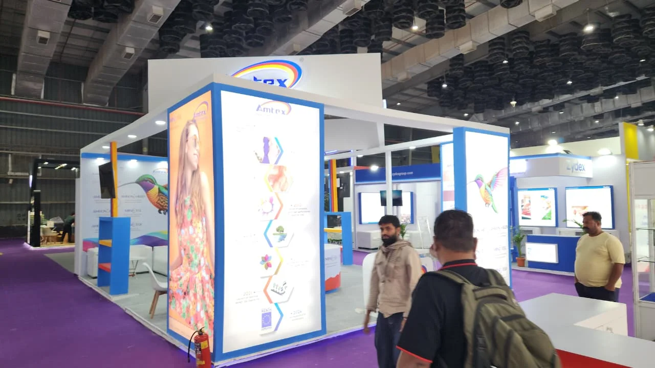 Lighting brand trade show booth design with illuminated display wall, Ahmedabad