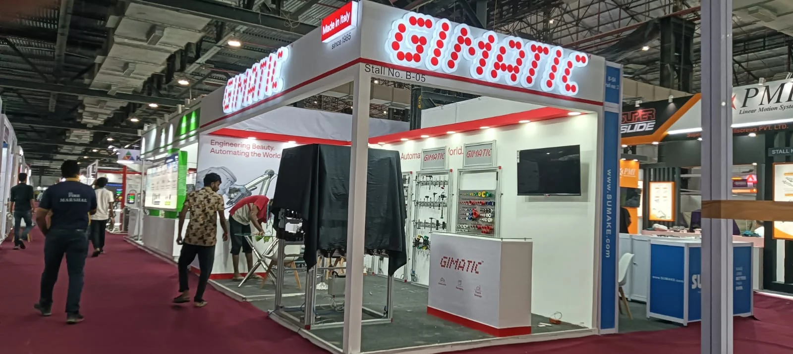 Custom plastics machinery exhibition booth at Plast Pack